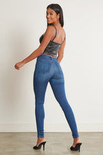 Alexa Mid-Rise Skinny Jeans. photo four