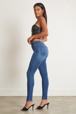Alexa Mid-Rise Skinny Jeans. photo three