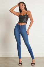 Alexa Mid-Rise Skinny Jeans. photo seven